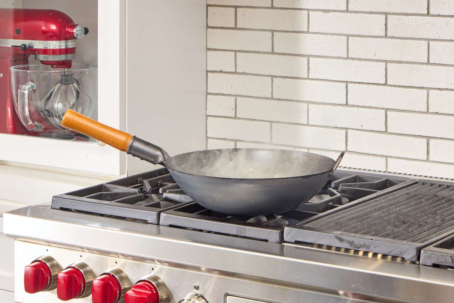 The Yosukata Carbon Steel Wok Pan on a stovetop