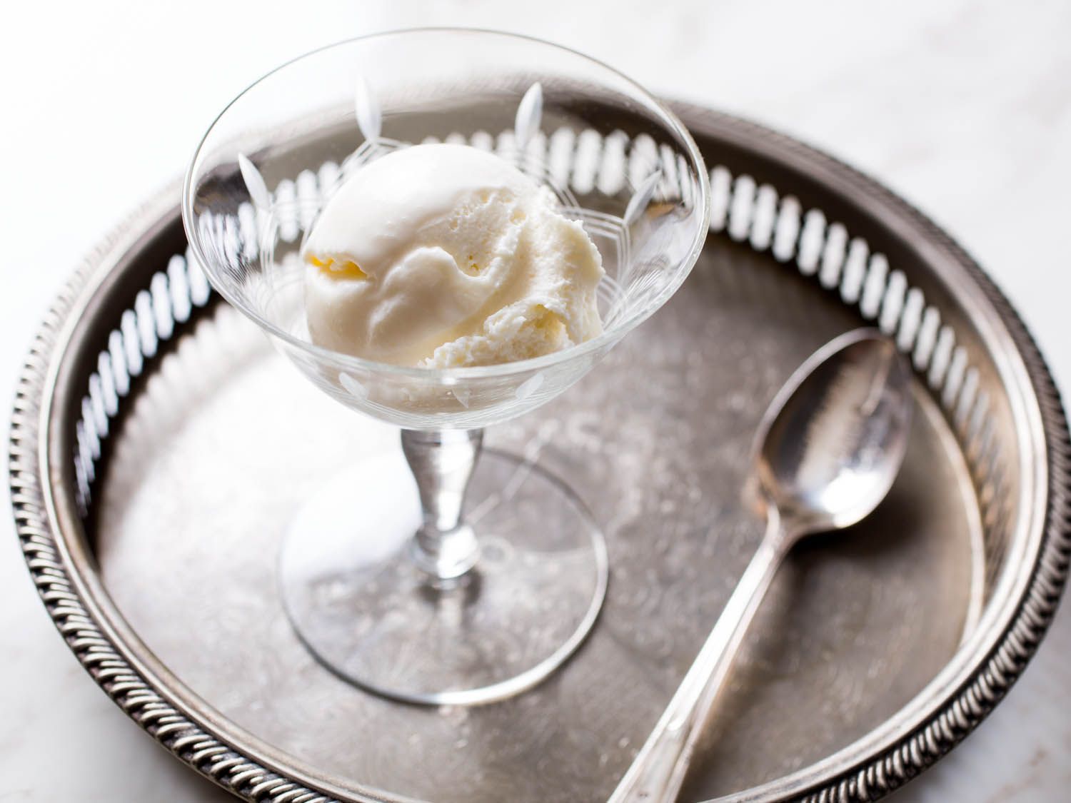 A scoop of Philadelphia-style ice cream, ready to serve.