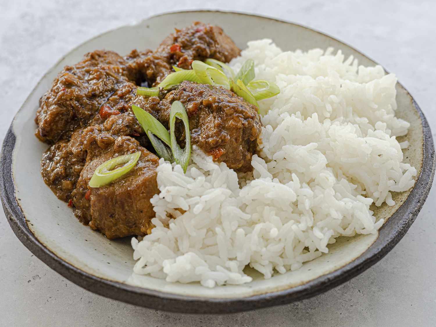 Bikol Express plated with rice