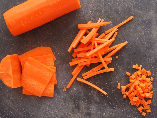 Raw carrot prepped at different stages for brunoise.