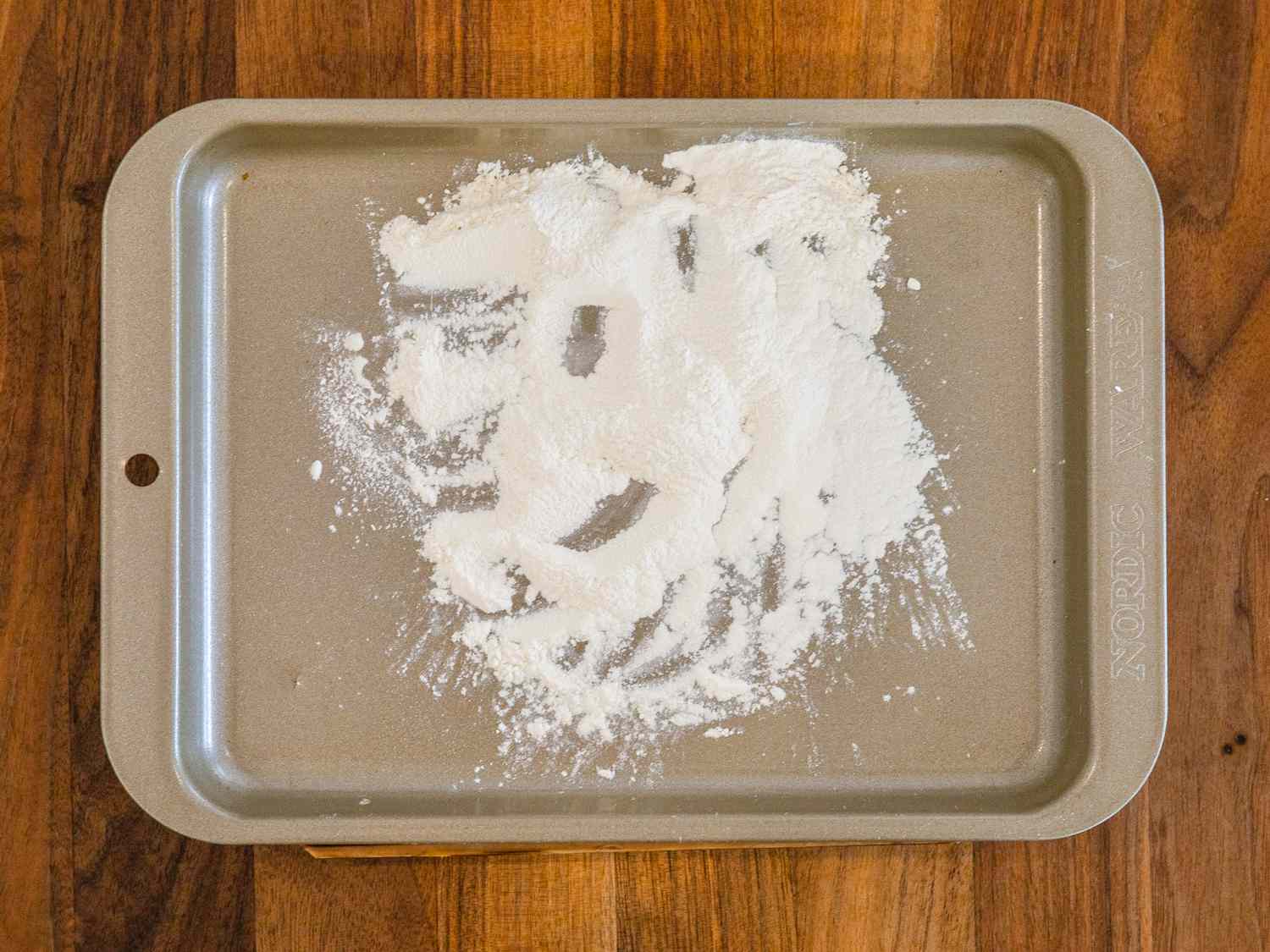Rice flour on a baking sheet