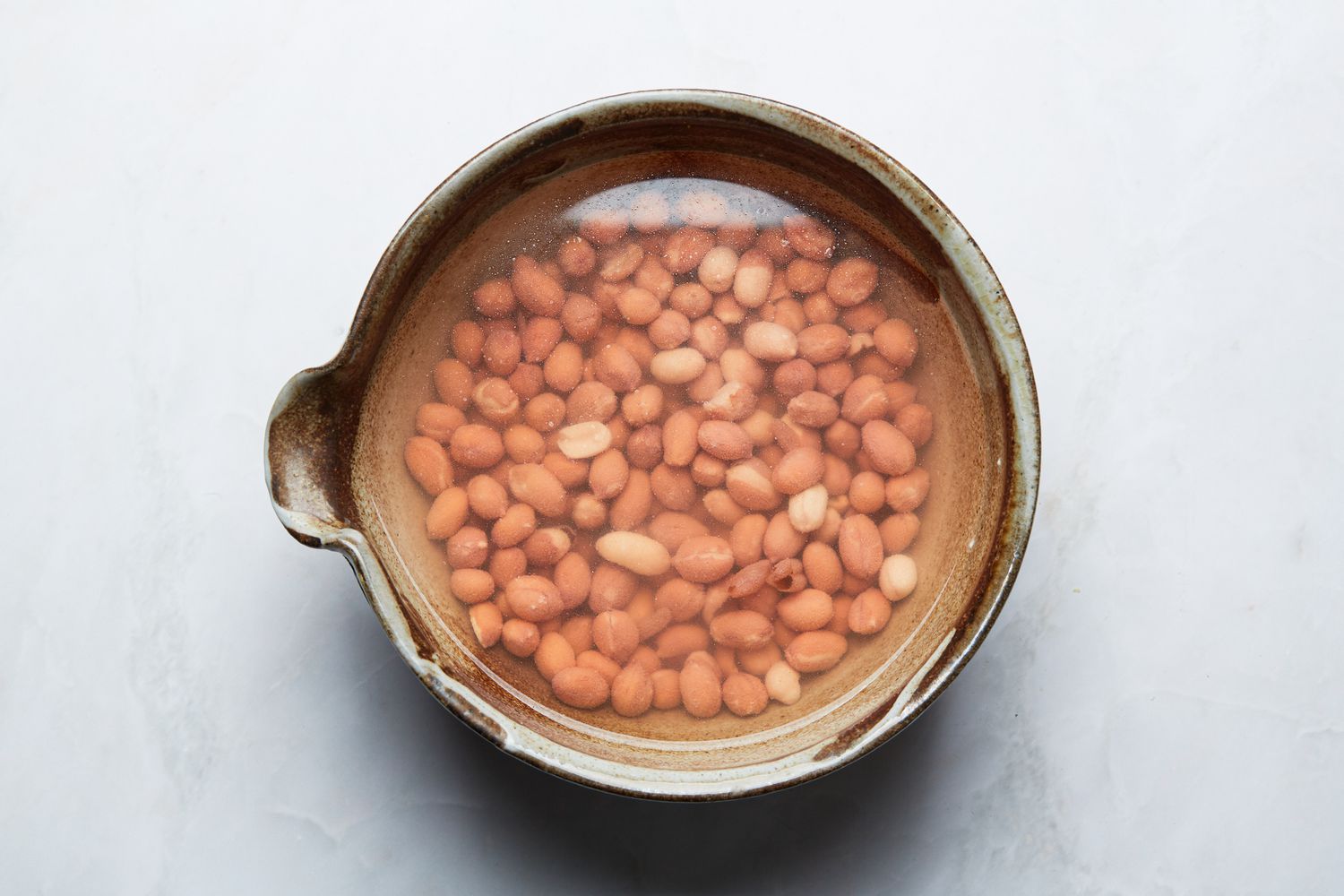Overhead view of peanuts soaking
