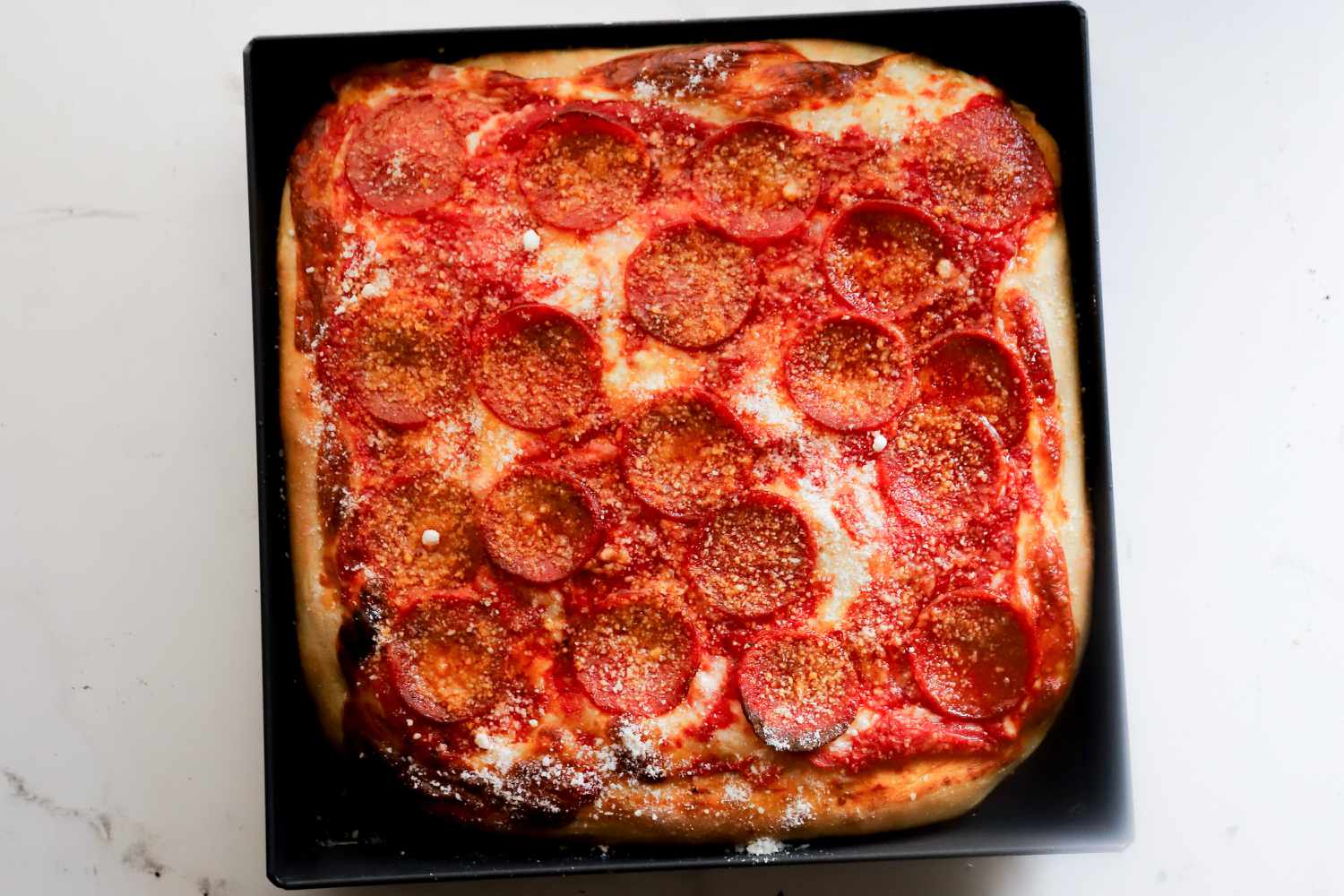 Pizza baked in the LloydPans 12x12x1.5 inch Sicilian Style Pizza Pan