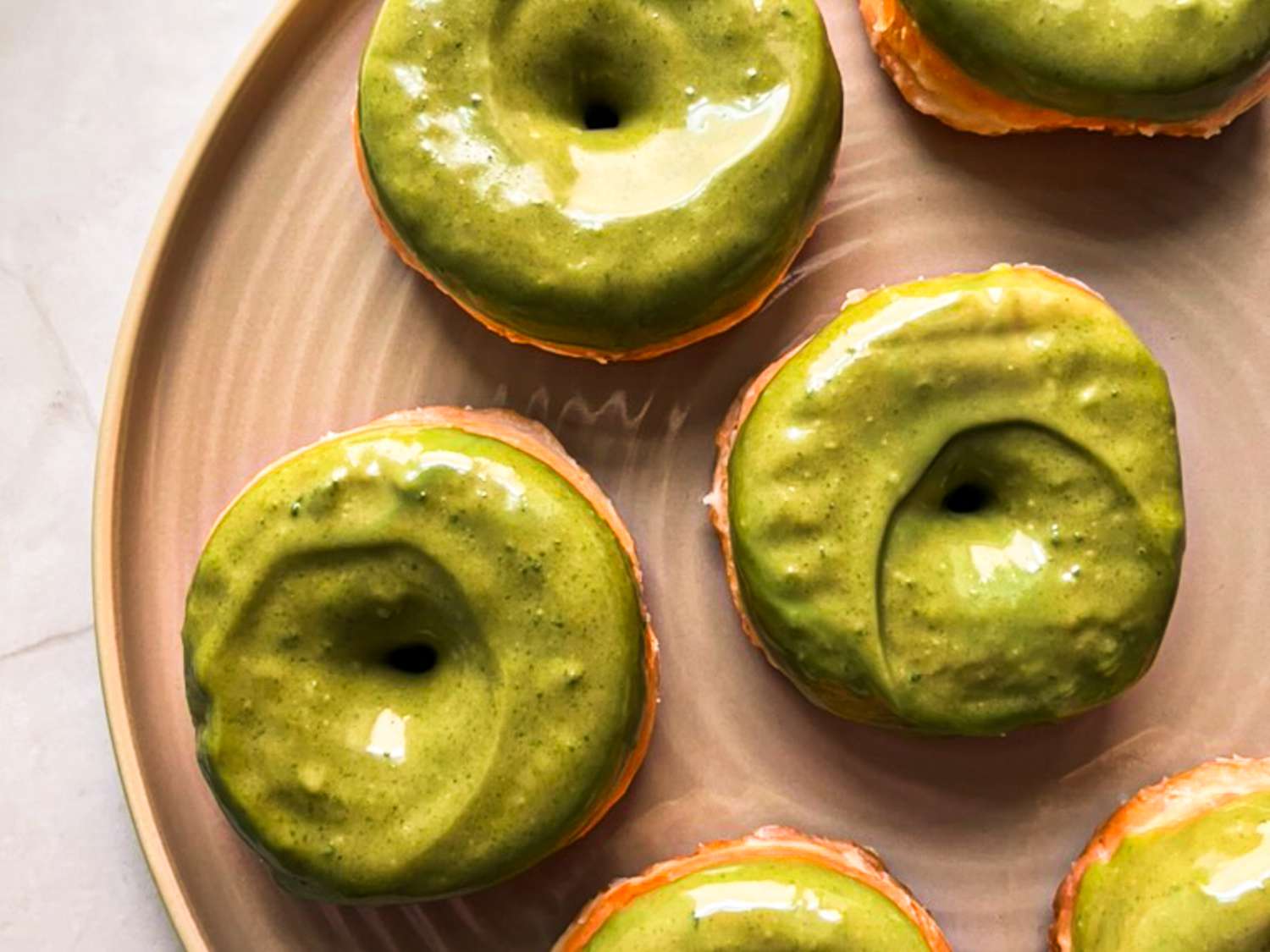Doughnuts covered with pistachio cream