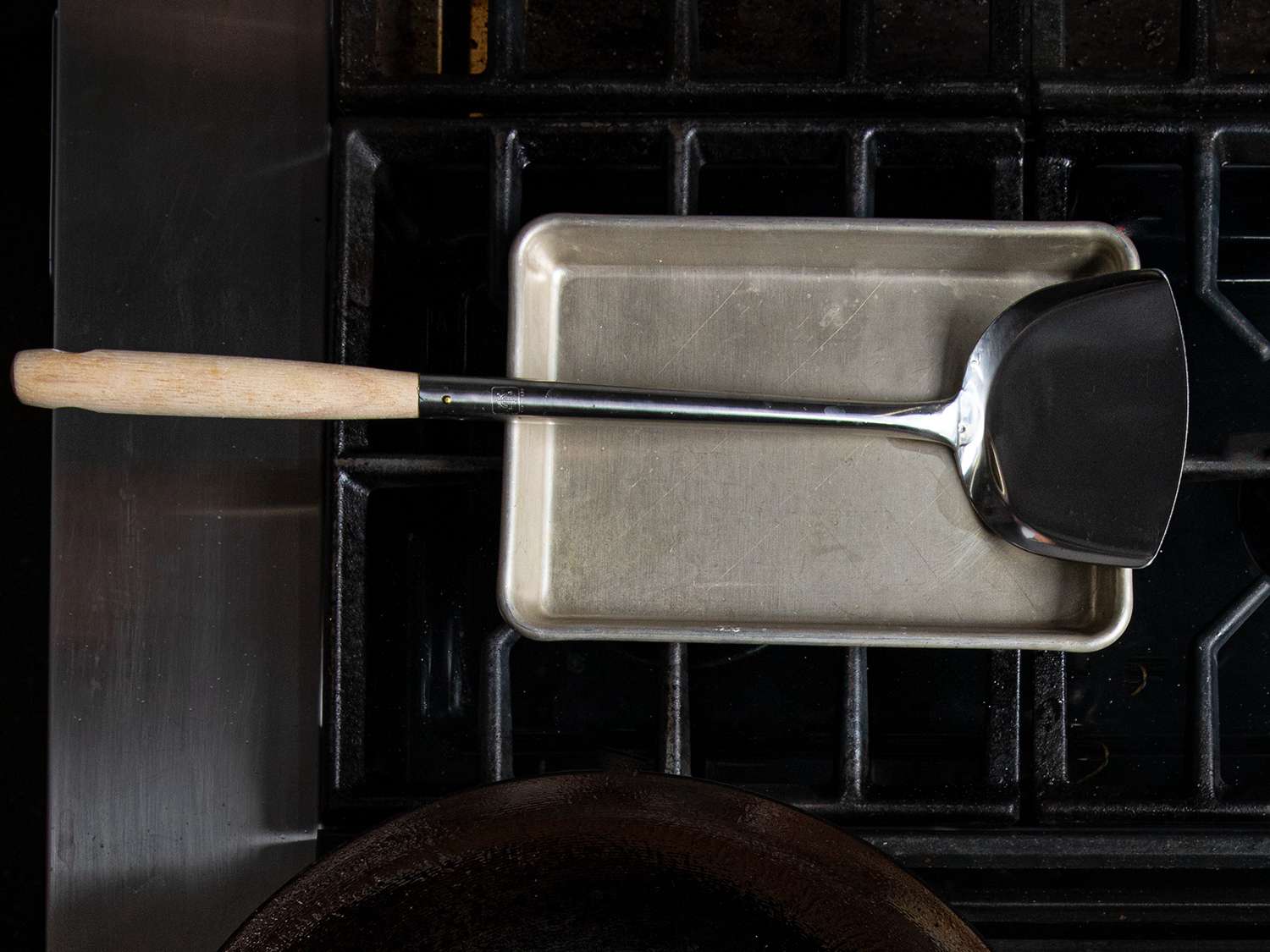 An overhead view of wok spatula (Chuan).