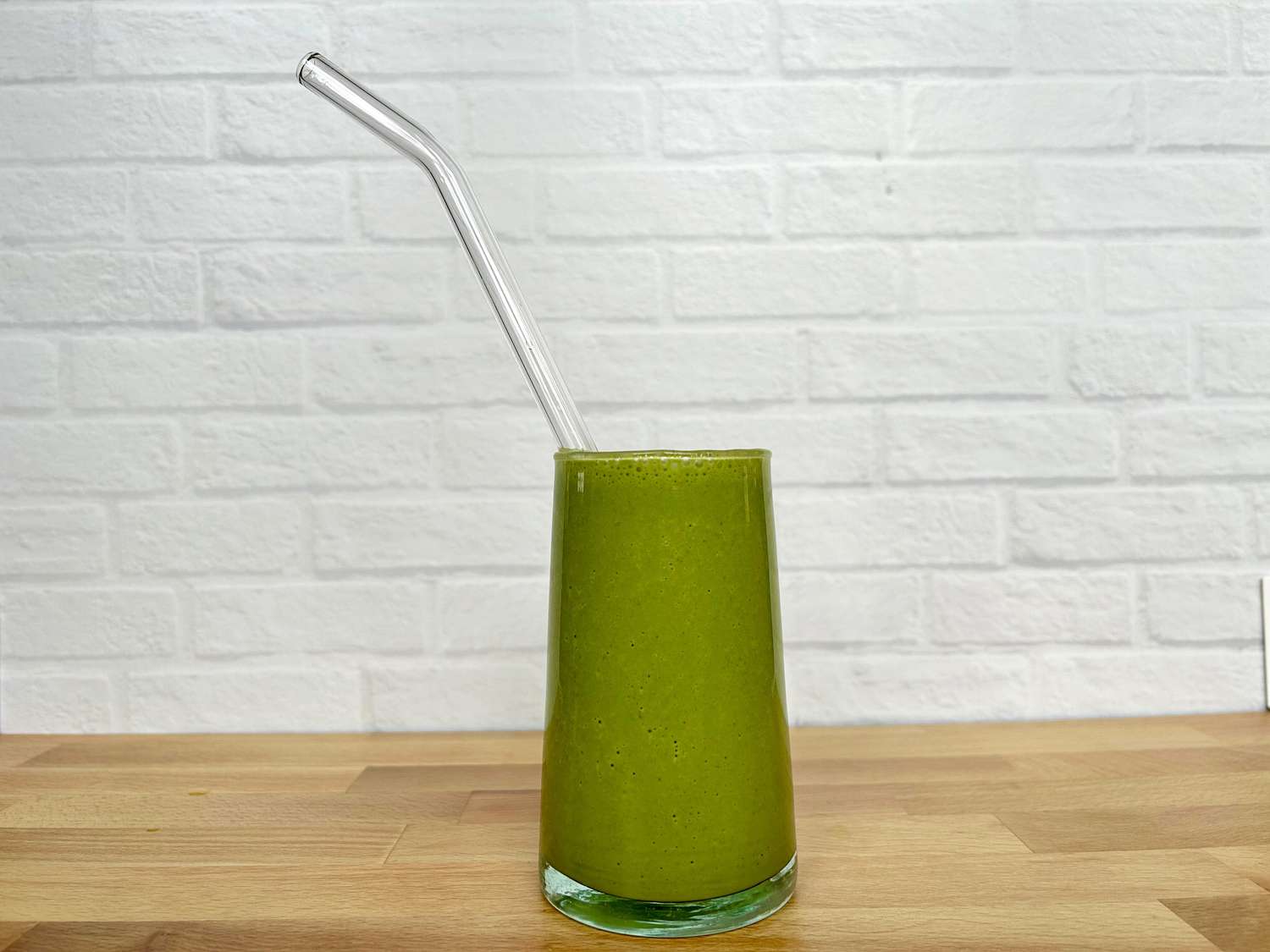 A glass straw in a smoothie