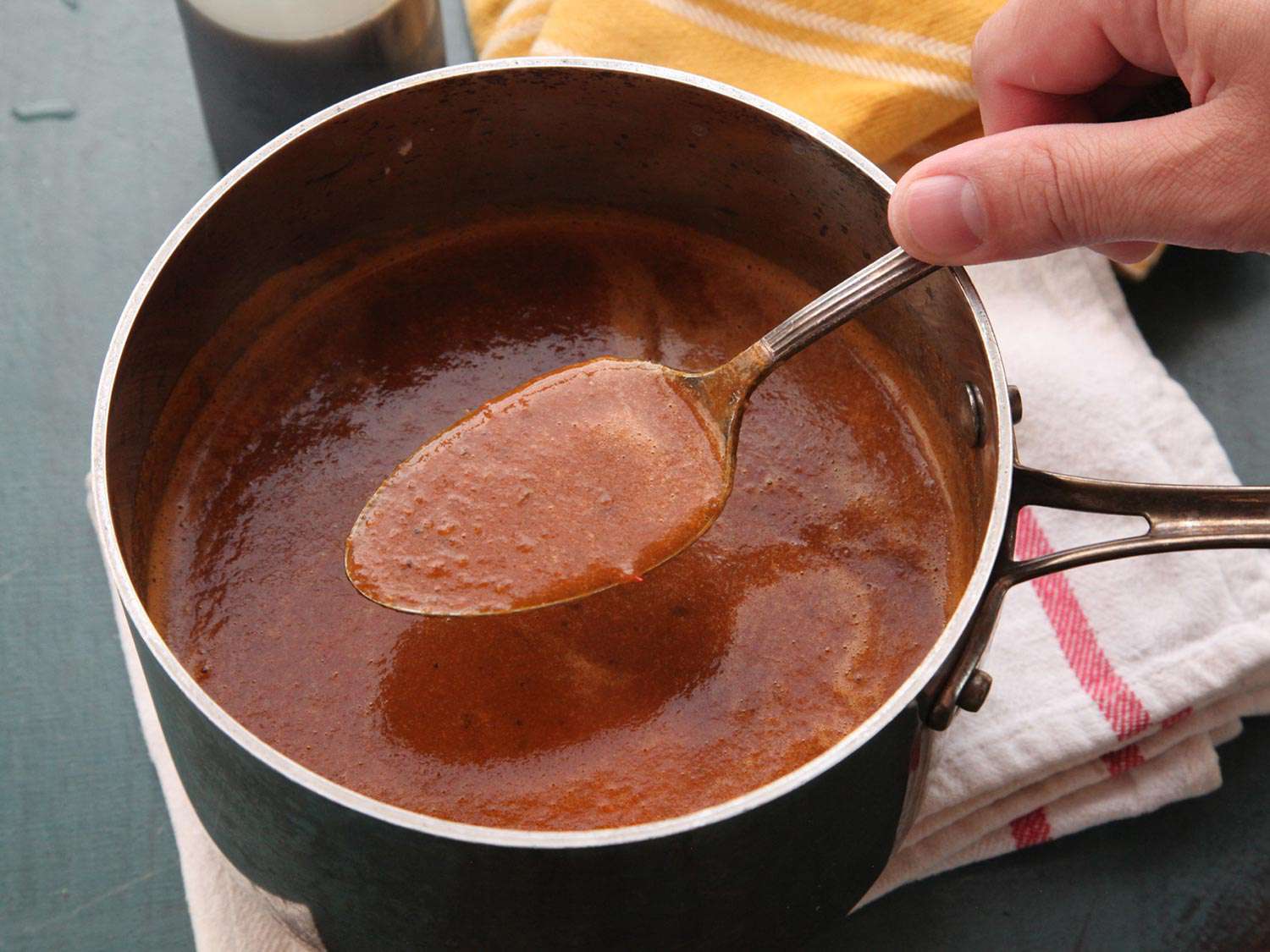 A saucepan containing the puréed sauce.