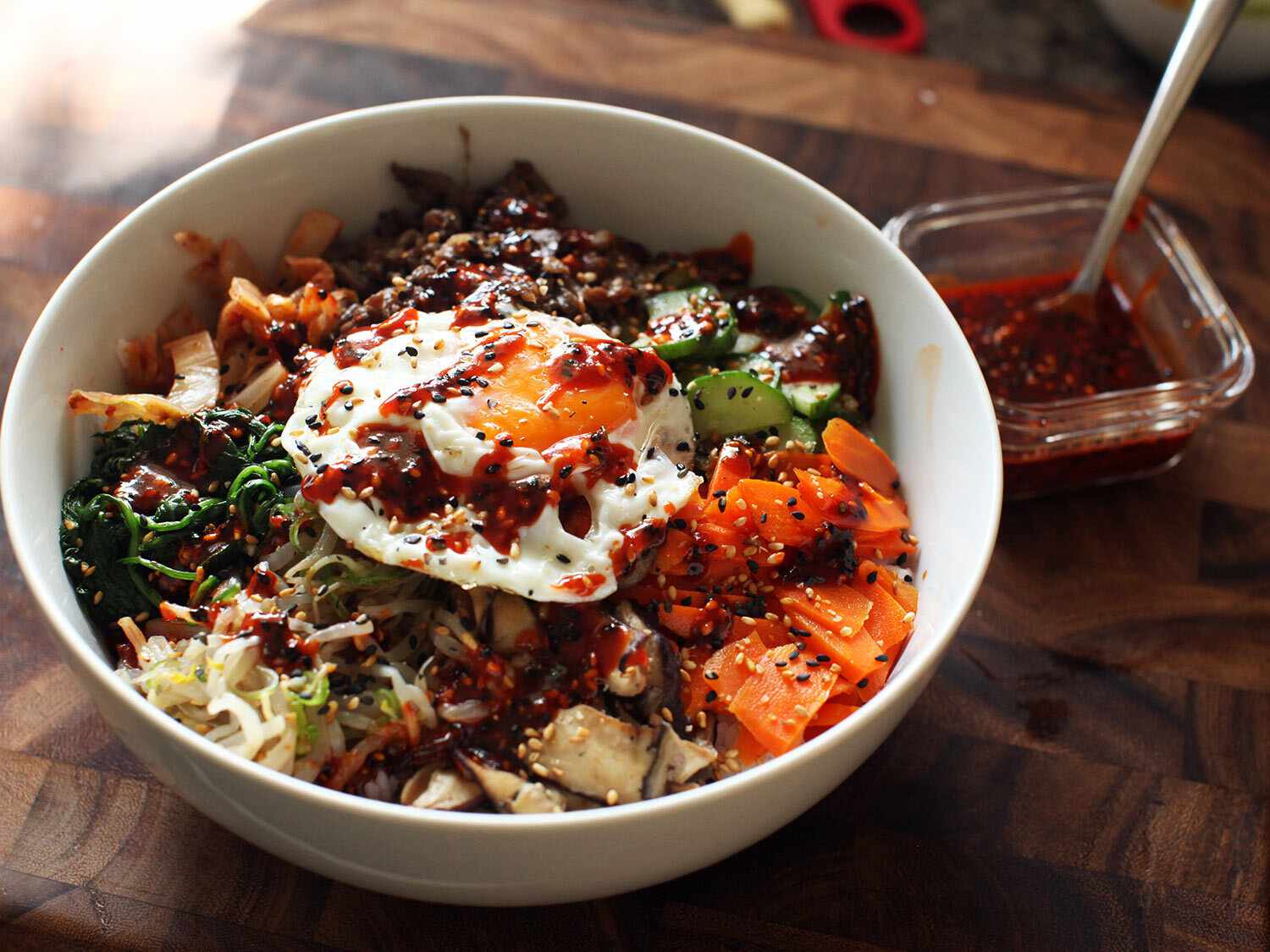 Bowl of bibimbap with a fried egg on top