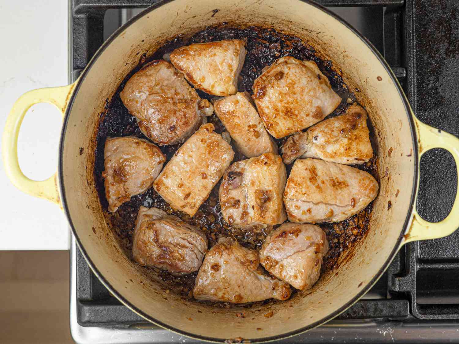 Pork and aromatics in a Dutch oven