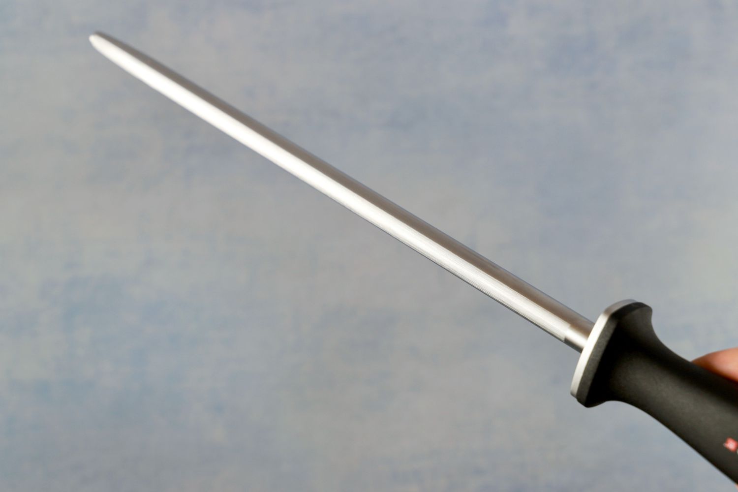 a closeup of a honing rod