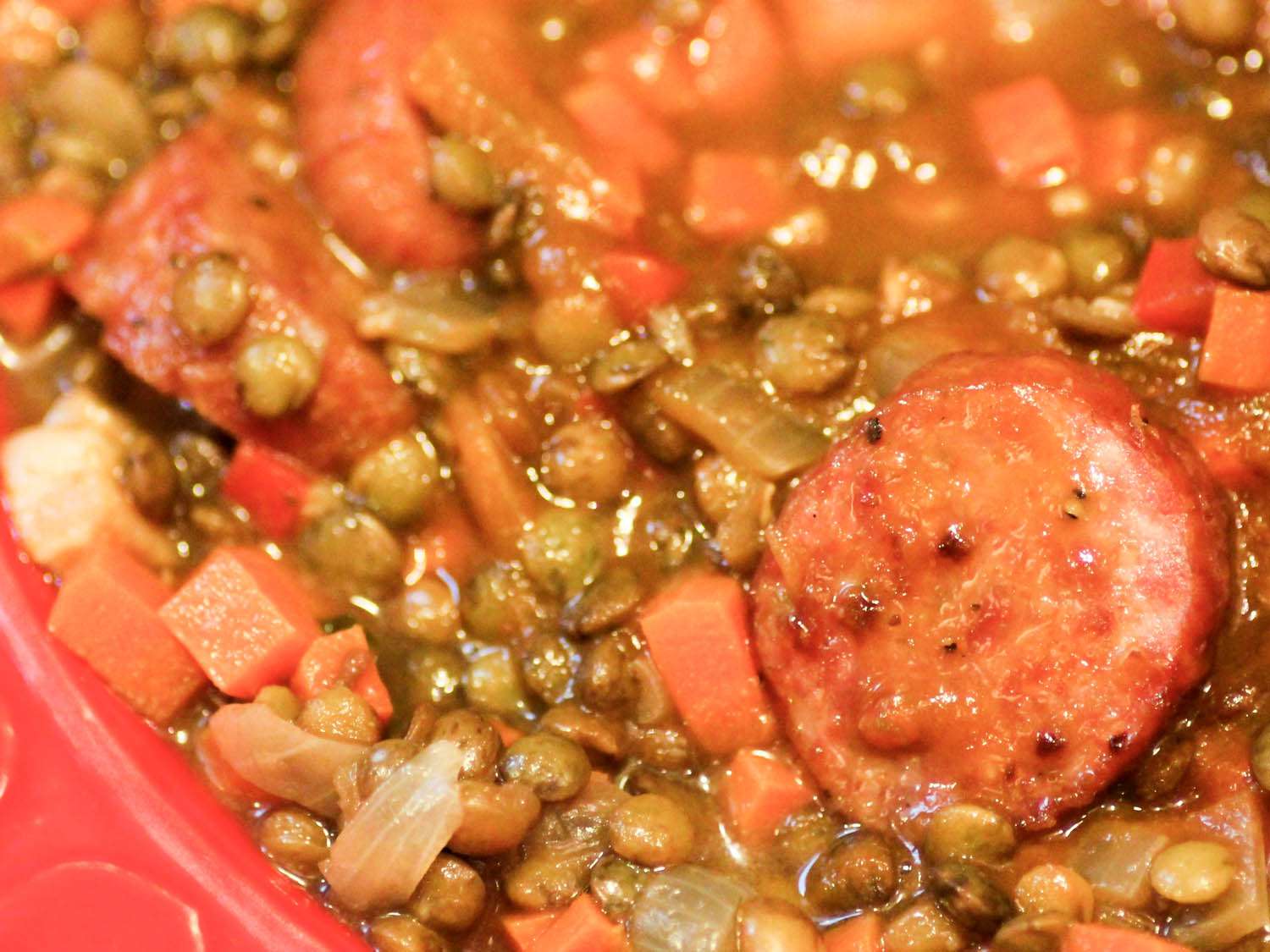 Closeup of cotechino con lenticchie.