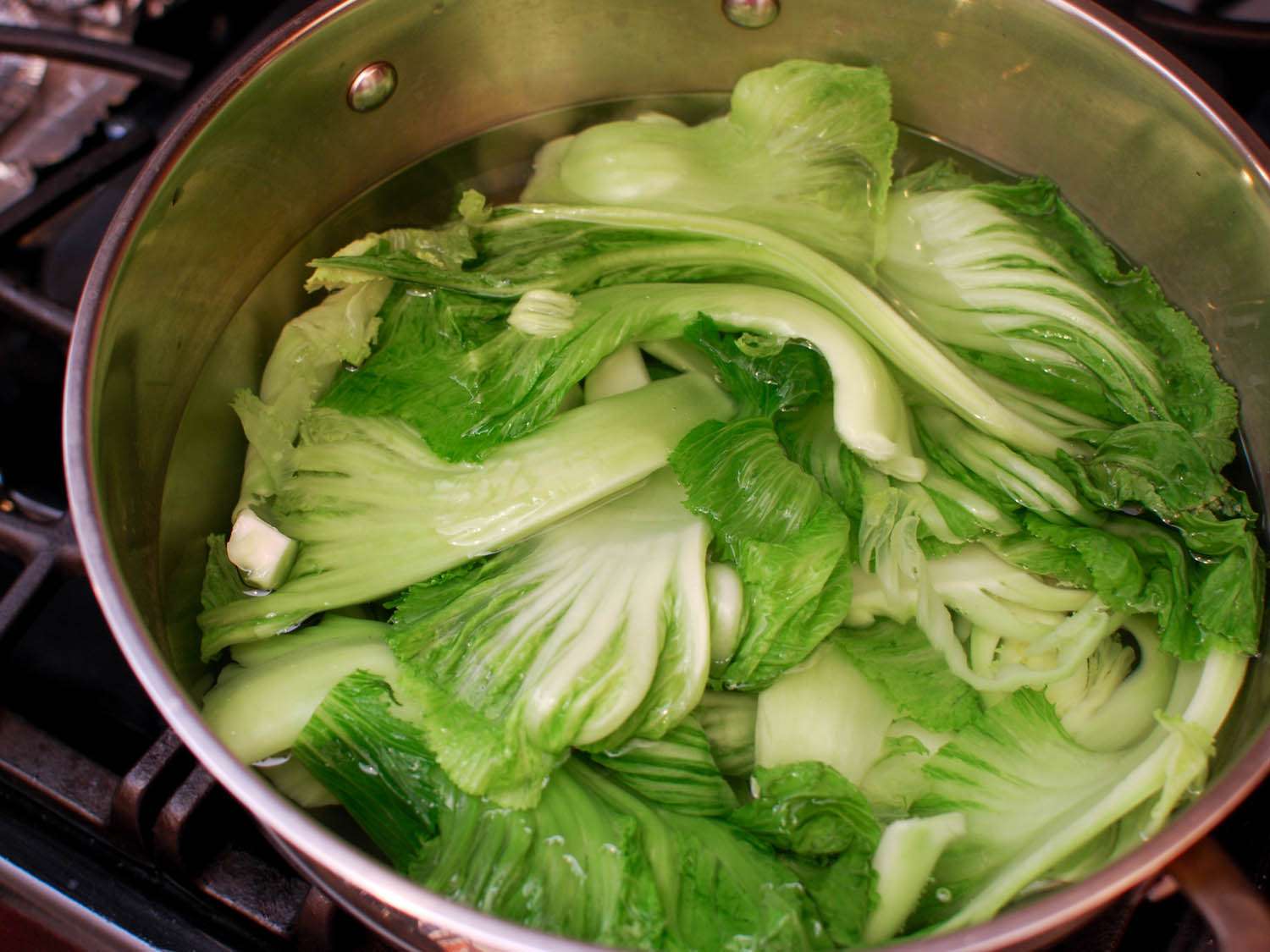 blanching Chinese mustard greens in salted water