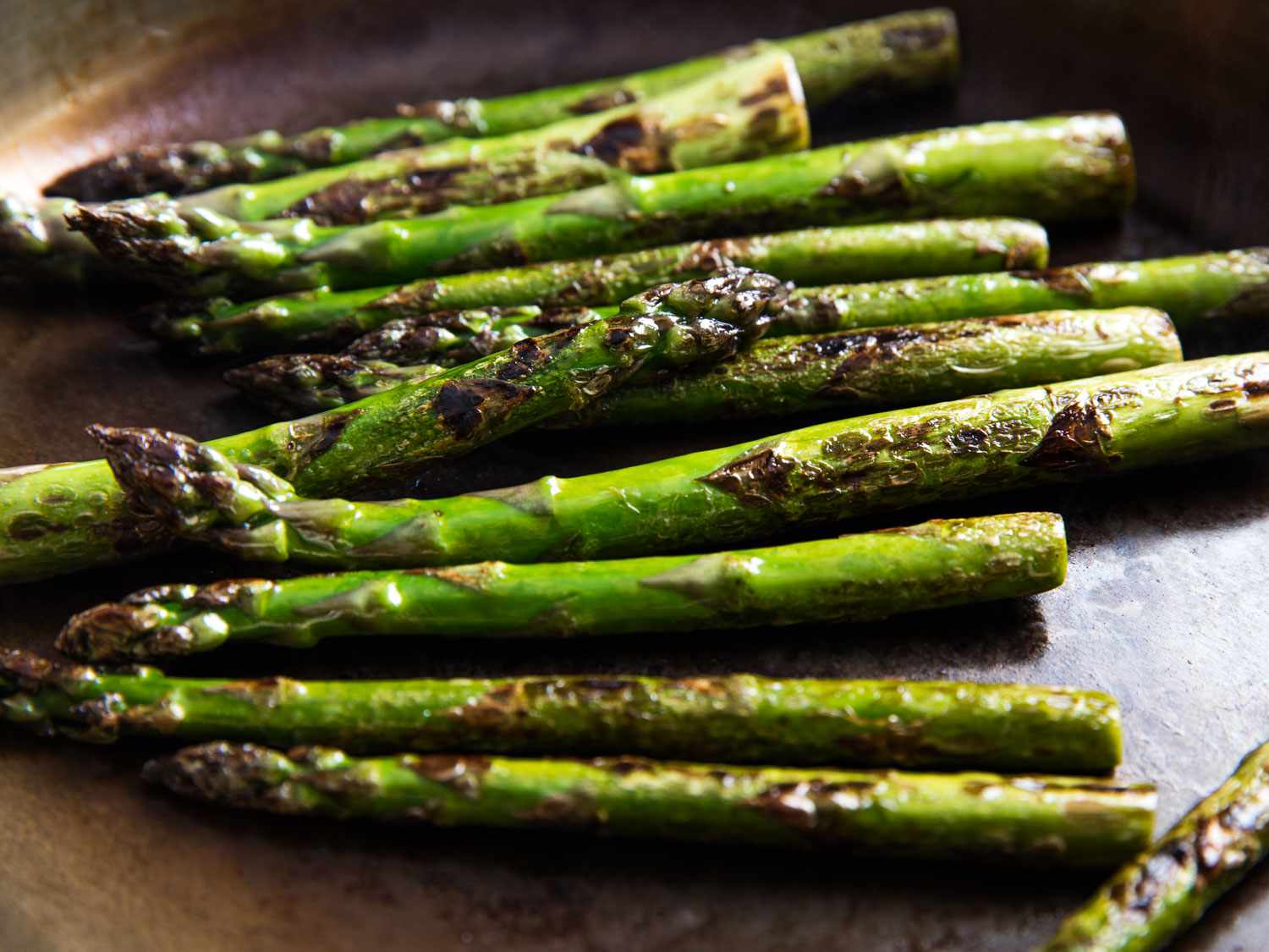 Sautéed spears of asparagus in a skillet