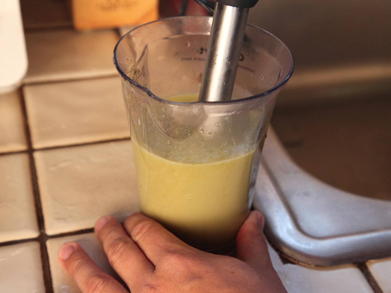 White beans is puréed until smooth with an immersion blender.