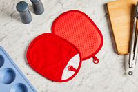 oxo oven mitts on a marble countertop
