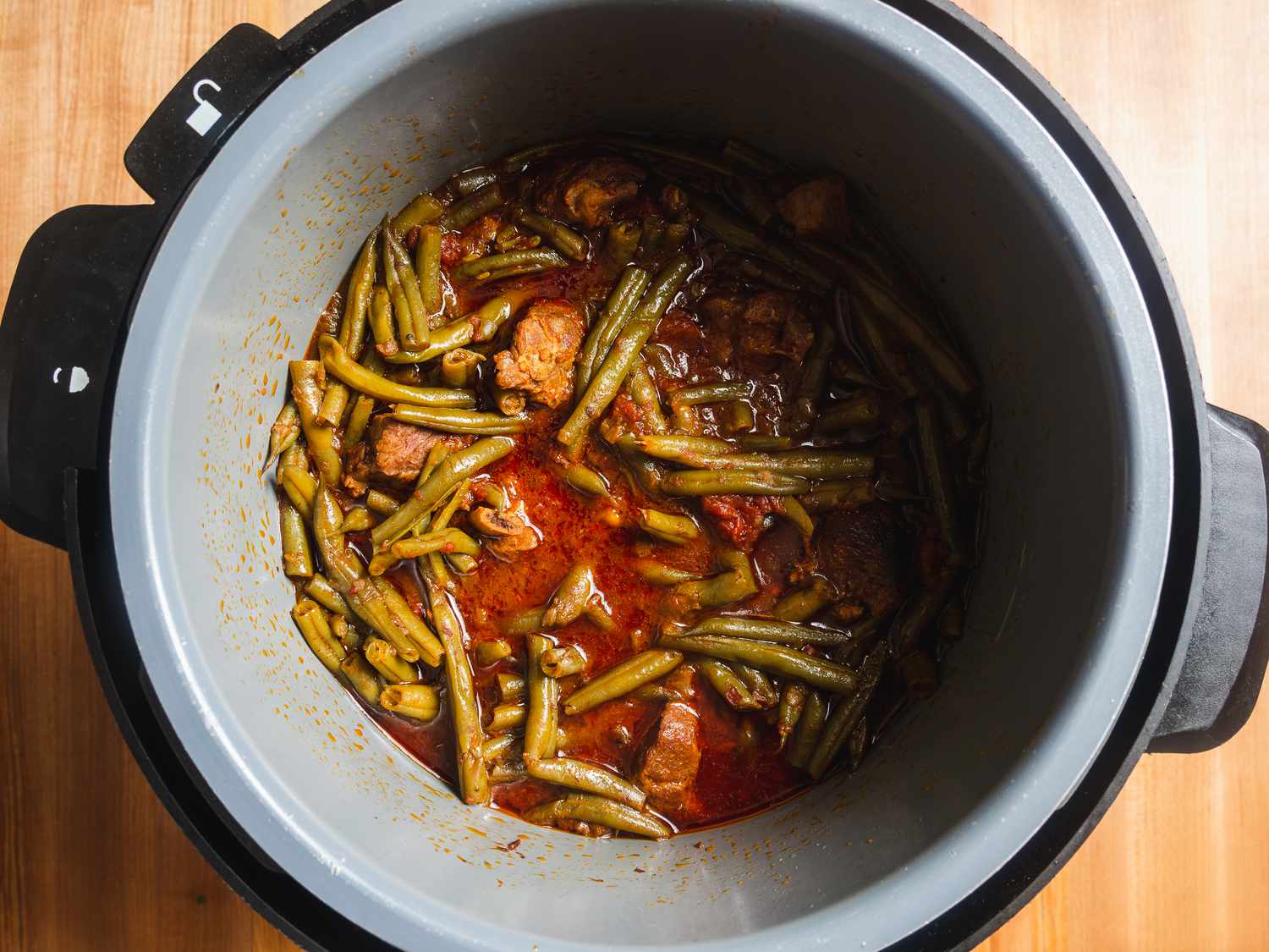 Overhead view of pressure cooker with lid removed