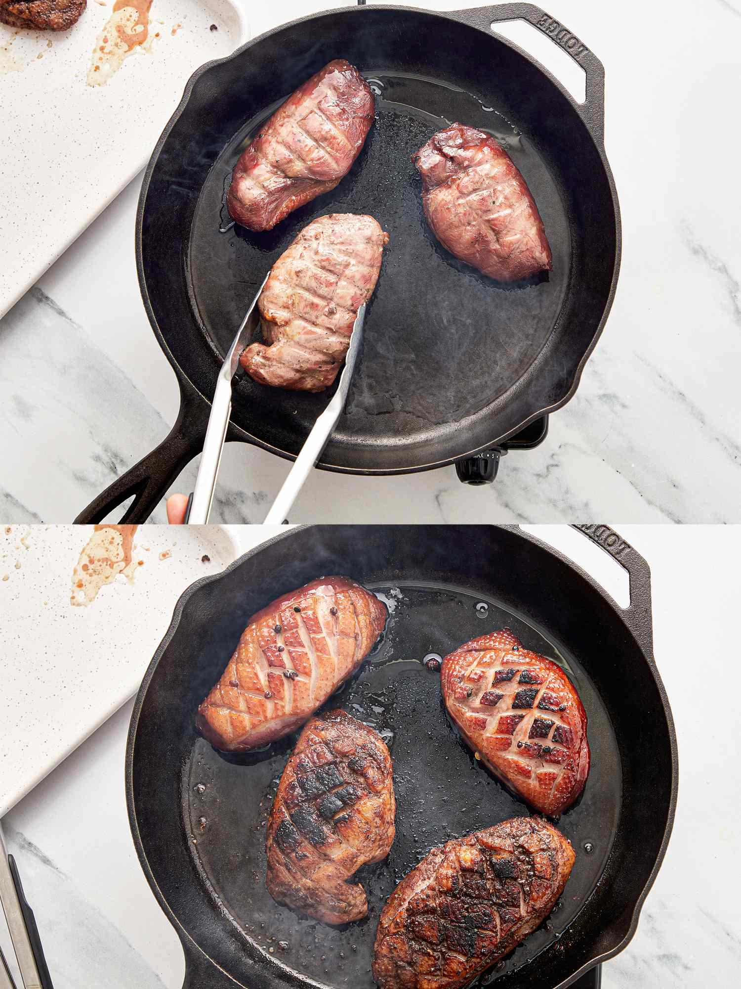 Duck breasts cooking in a cast iron skillet