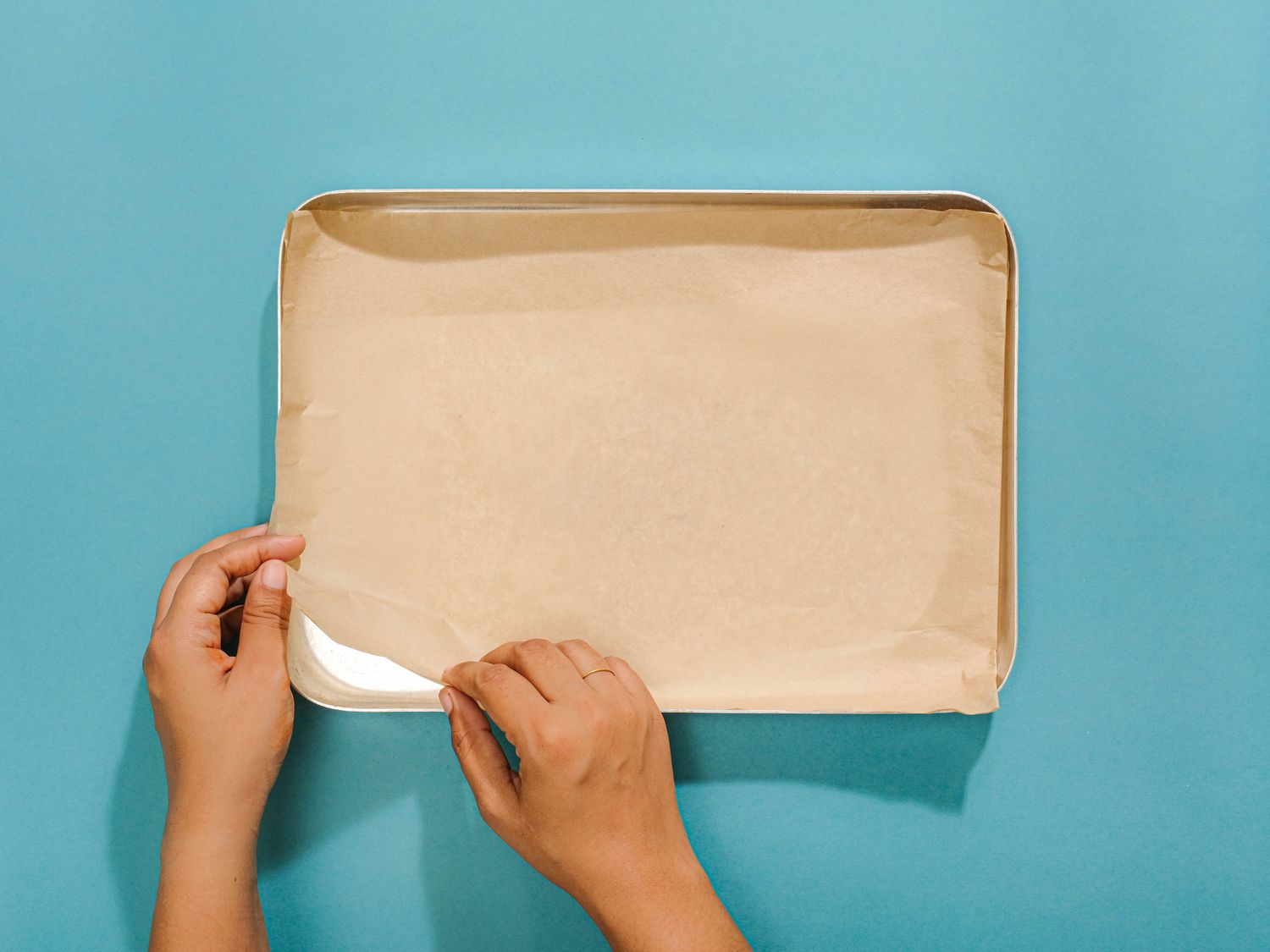 Sheet pan lined with parchment paper 