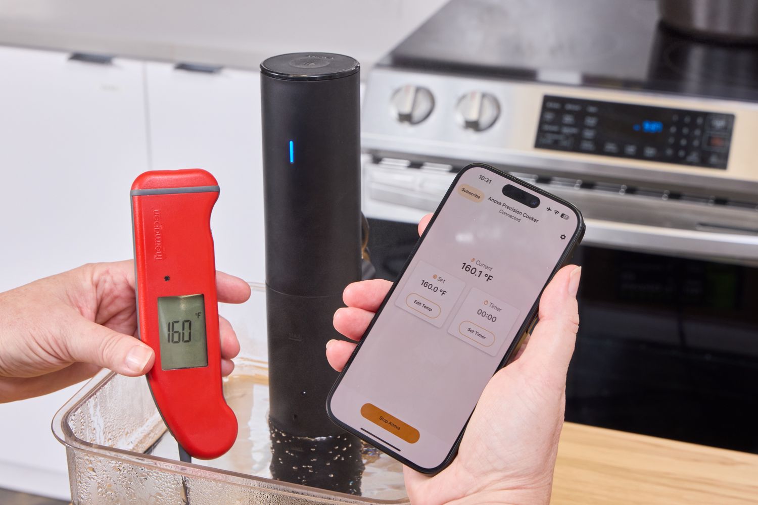 A person using an instant-read thermometer and app to use a sous vide machine