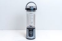 Empty Ninja Blast Portable Blender on white countertop