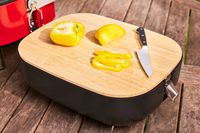 Sliced peppers on the cutting board lid of a Cuisinart CGG-750 Venture Gas Grill