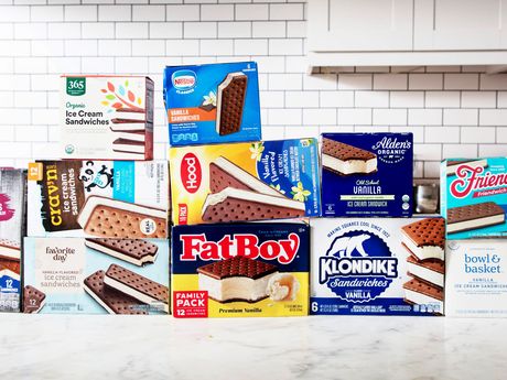 Boxes of ice cream sandwiches on a kitchen counter.