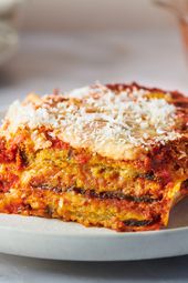 Slice of eggplant parmesan served on a plate