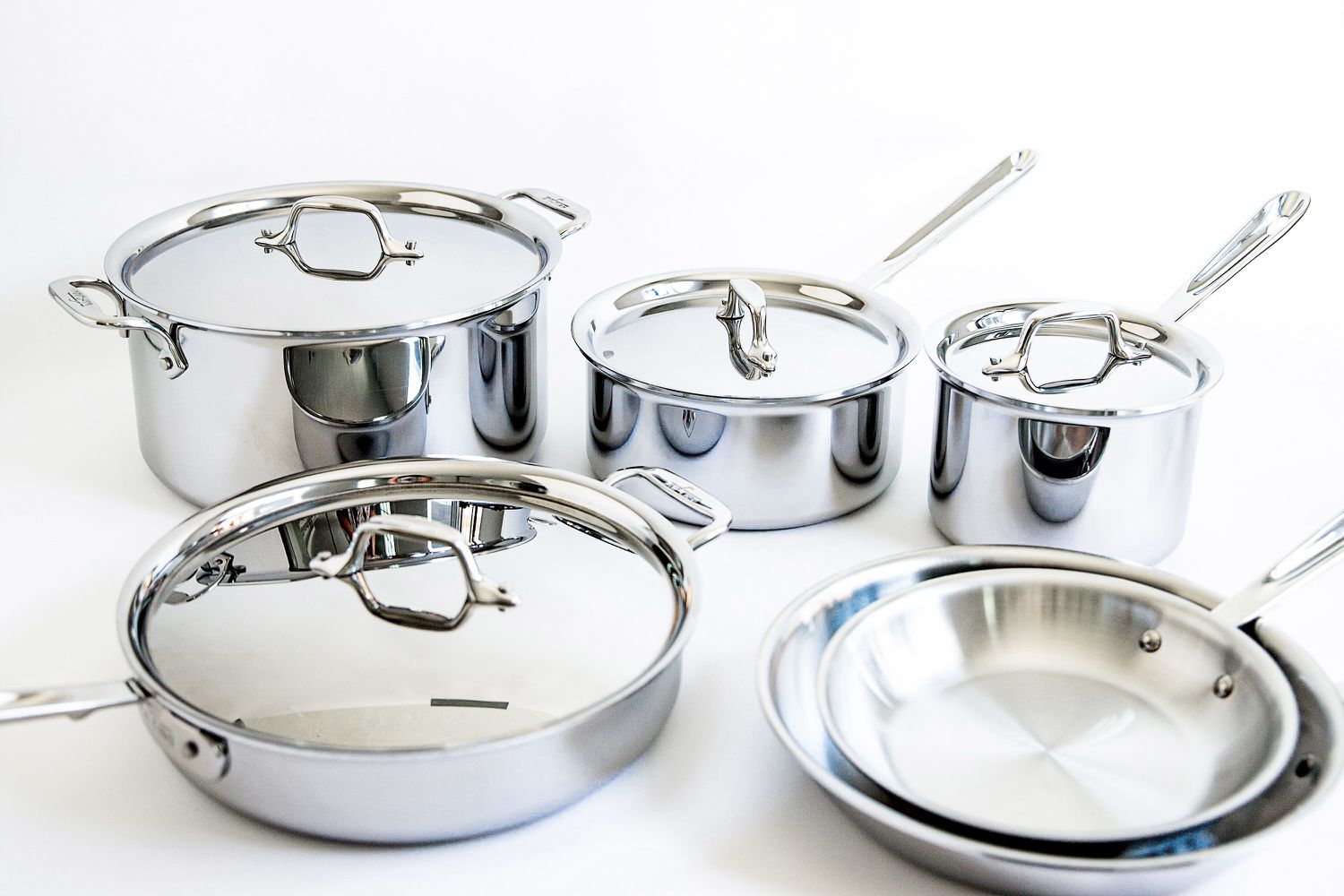 All-Clad D3 3-Ply Stainless Steel Cookware Set 10 Piece on a white surface