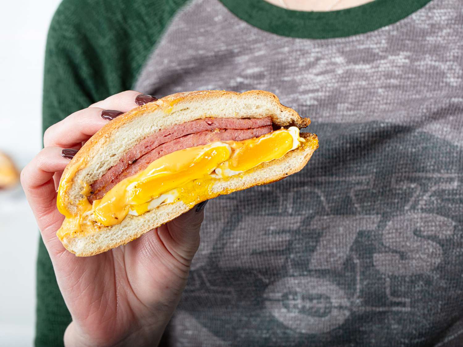 Pork roll half in front of an NY Jets shirt.