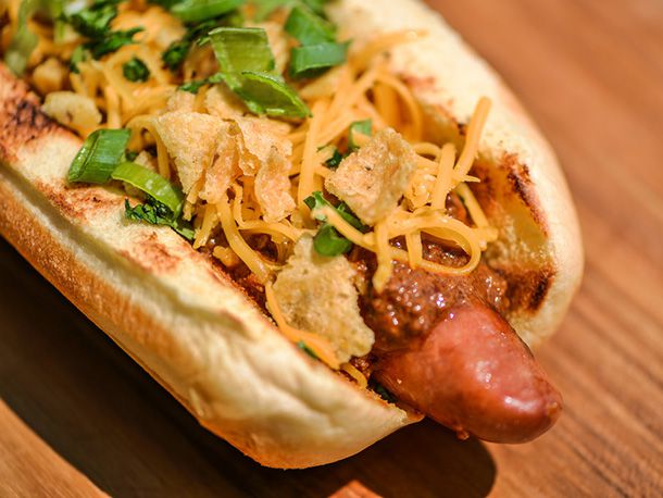 Closeup of a Frito pie dog.