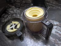 the slushie result in the ninja creami pint container inside the vessel.