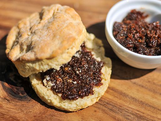 Bacon jam slathered on a biscuit.