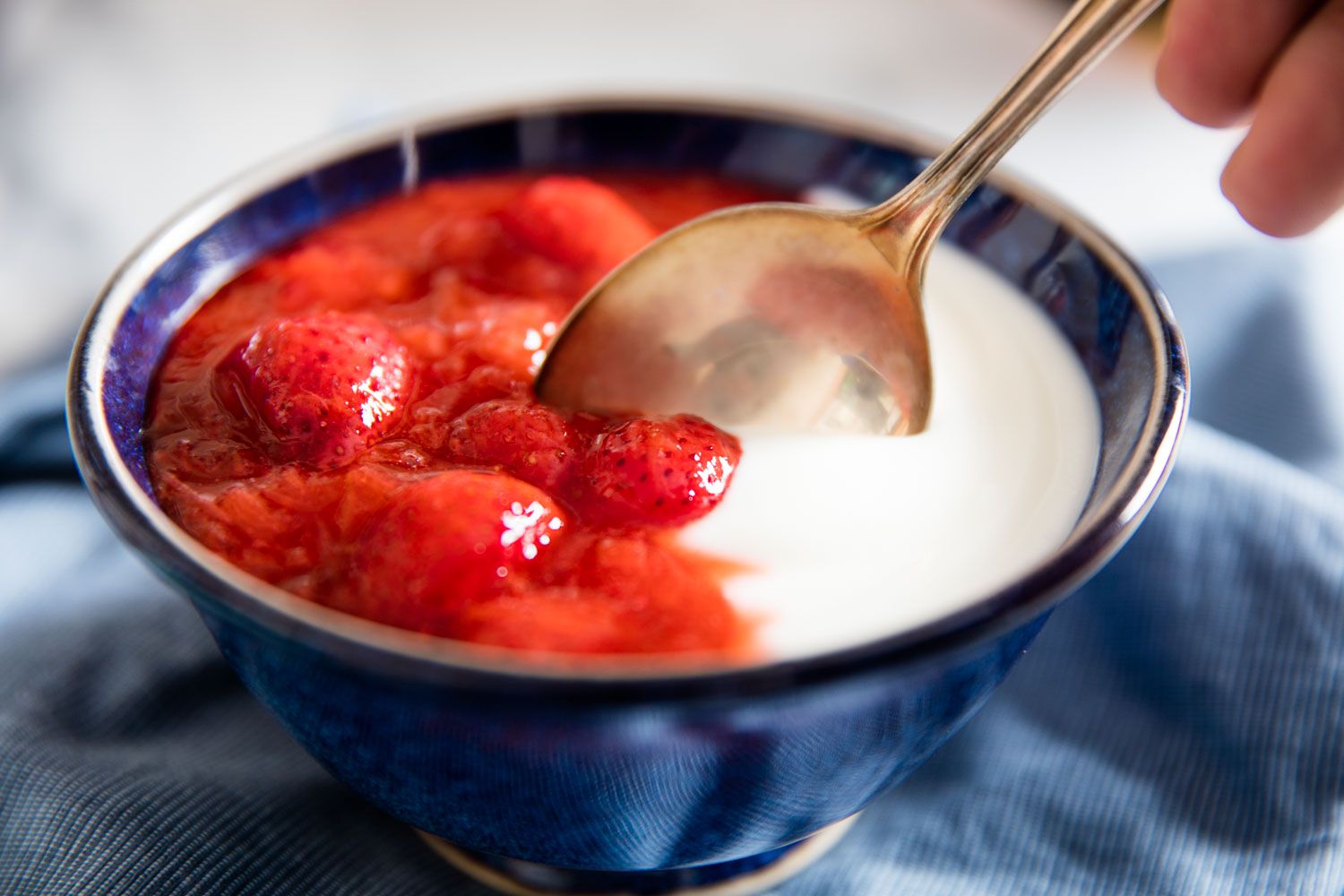 A bowl of strawberry-rhubarb compote and yogurt.