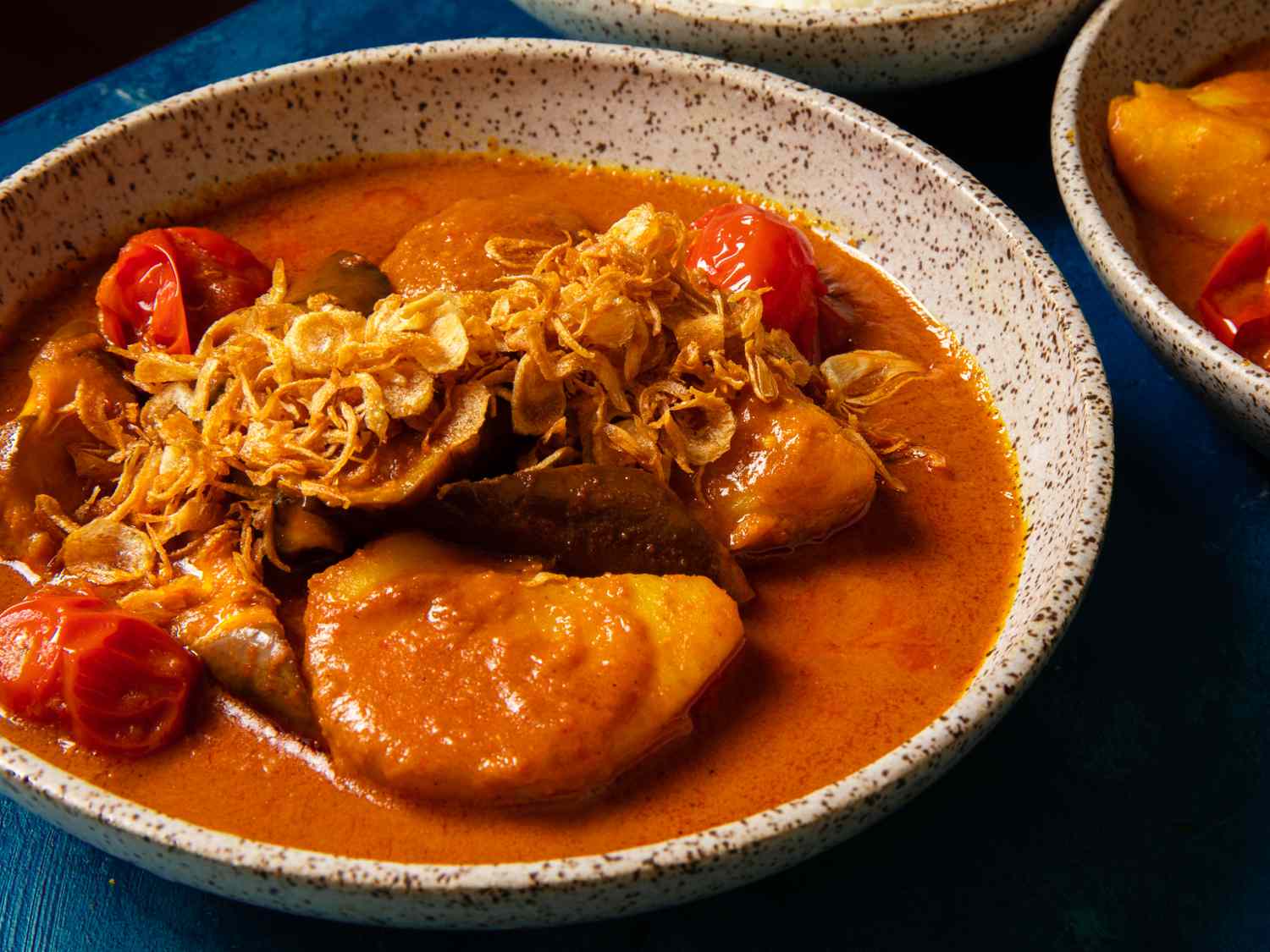 close up of Gaeng Garee Makheua Yao (Thai Yellow Curry with Eggplant)