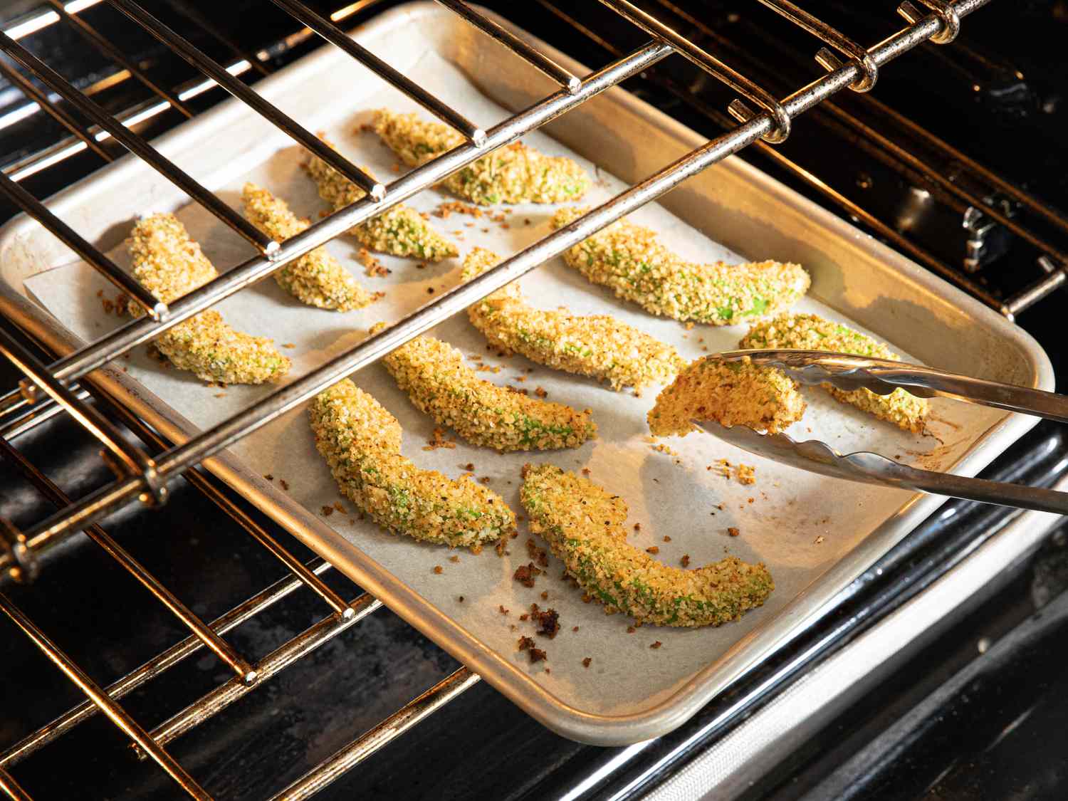 Flipping fries in the oven