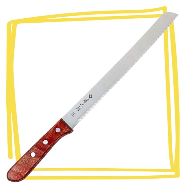 A bread knife with a wooden handle and serrated blade