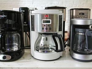 A collection of inexpensive coffee makers on a kitchen counter