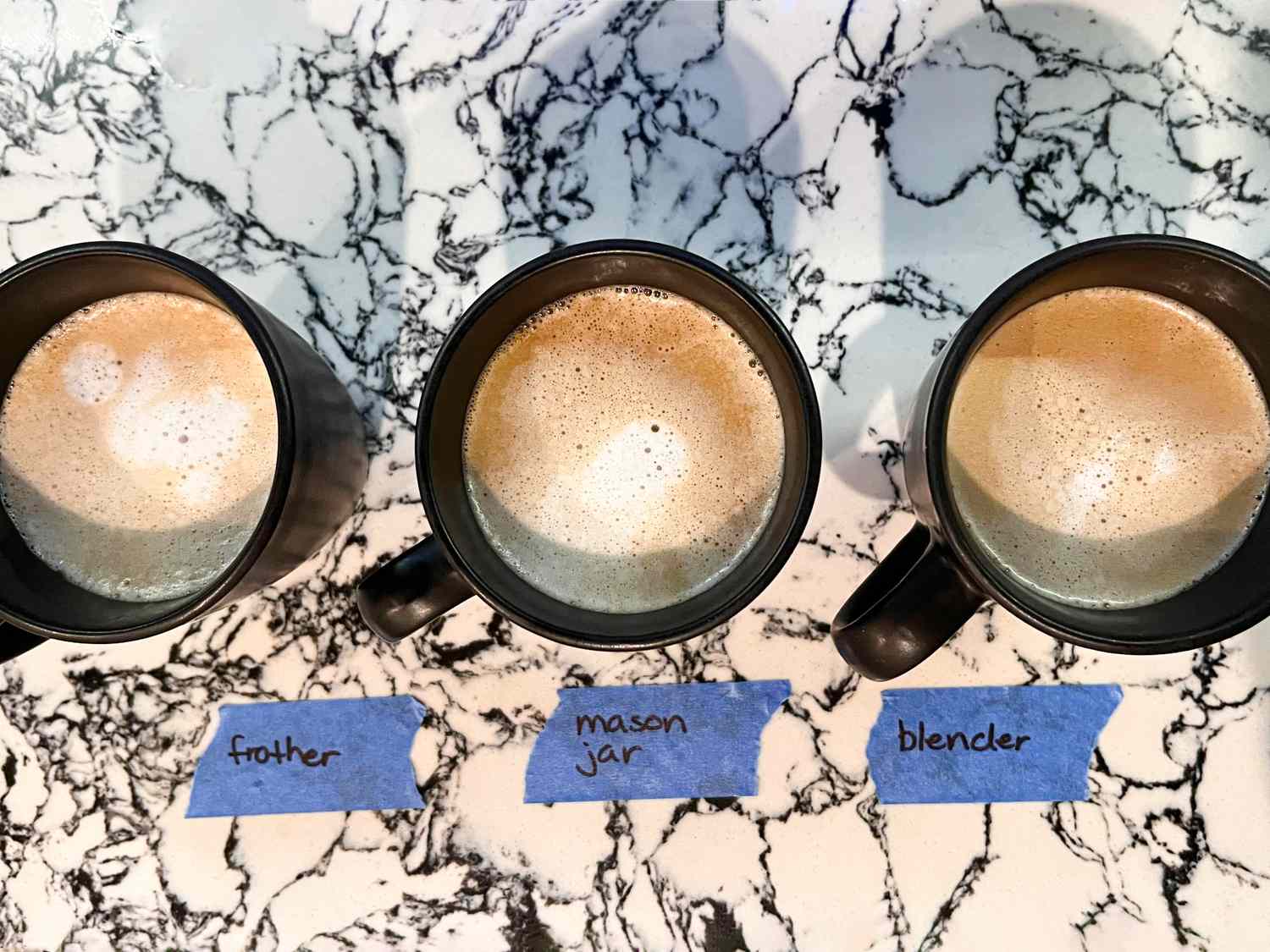 Overhead view of three cups of coffee 