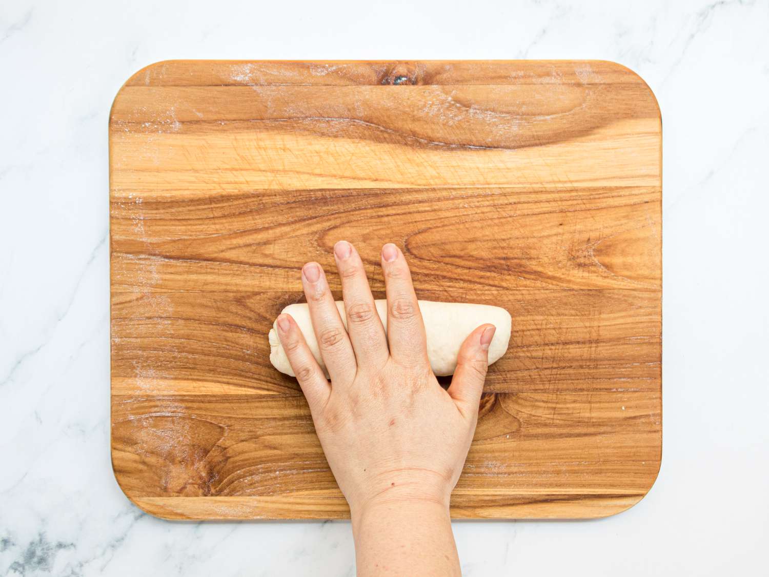 Overhead view of rolling dough
