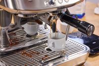 Espresso pours from the Breville The Barista Pro Espresso Machine