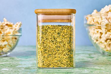 Side view of caesar dust in jar