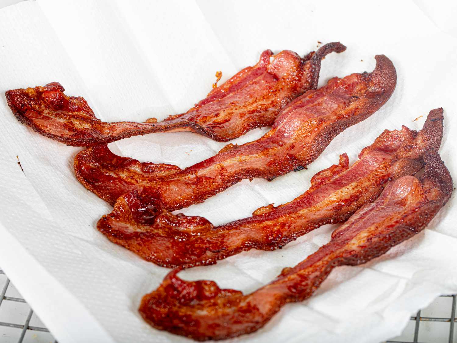 Air Fryer bacon on a paper towel