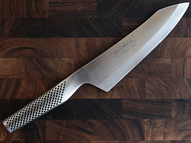 Global G-7 Oriental Deba on wood cutting board