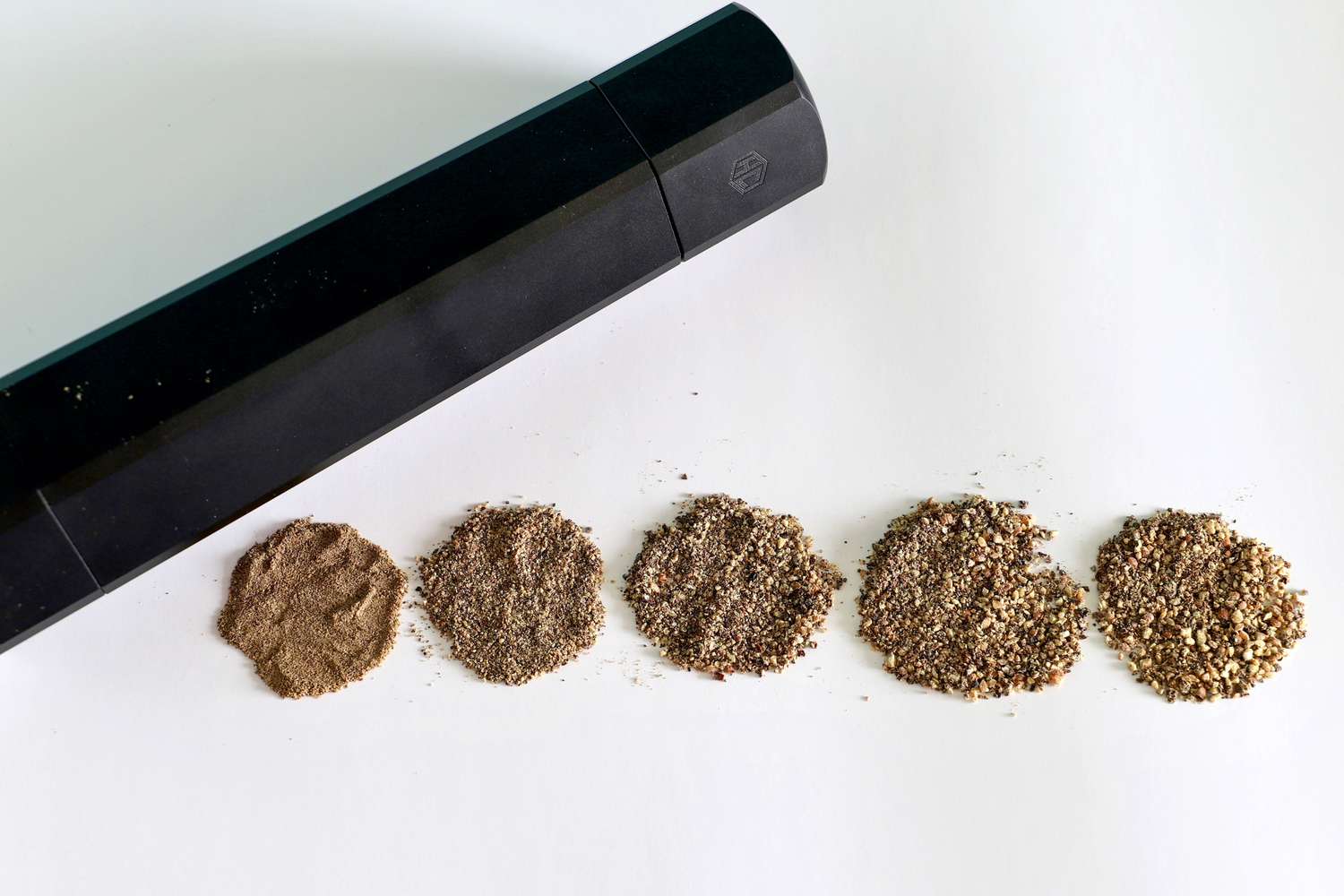the hexmill with different grind sizes of pepper