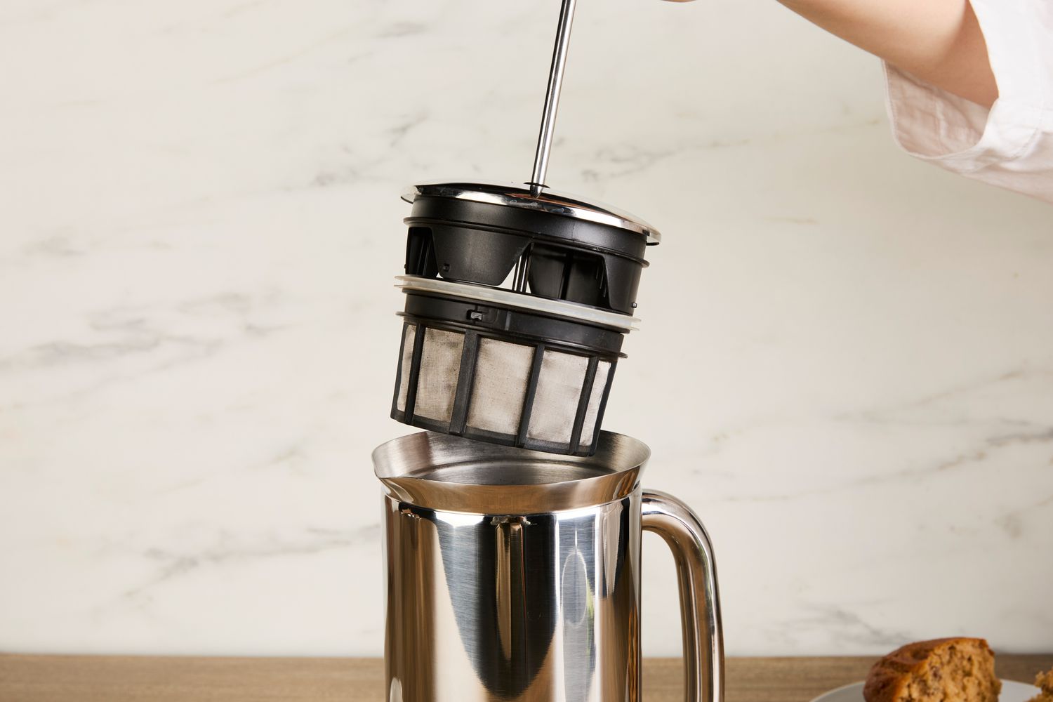 Person taking apart Espro P7 French Press