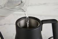 Water being poured into Saki Baristan Electric Gooseneck Kettle