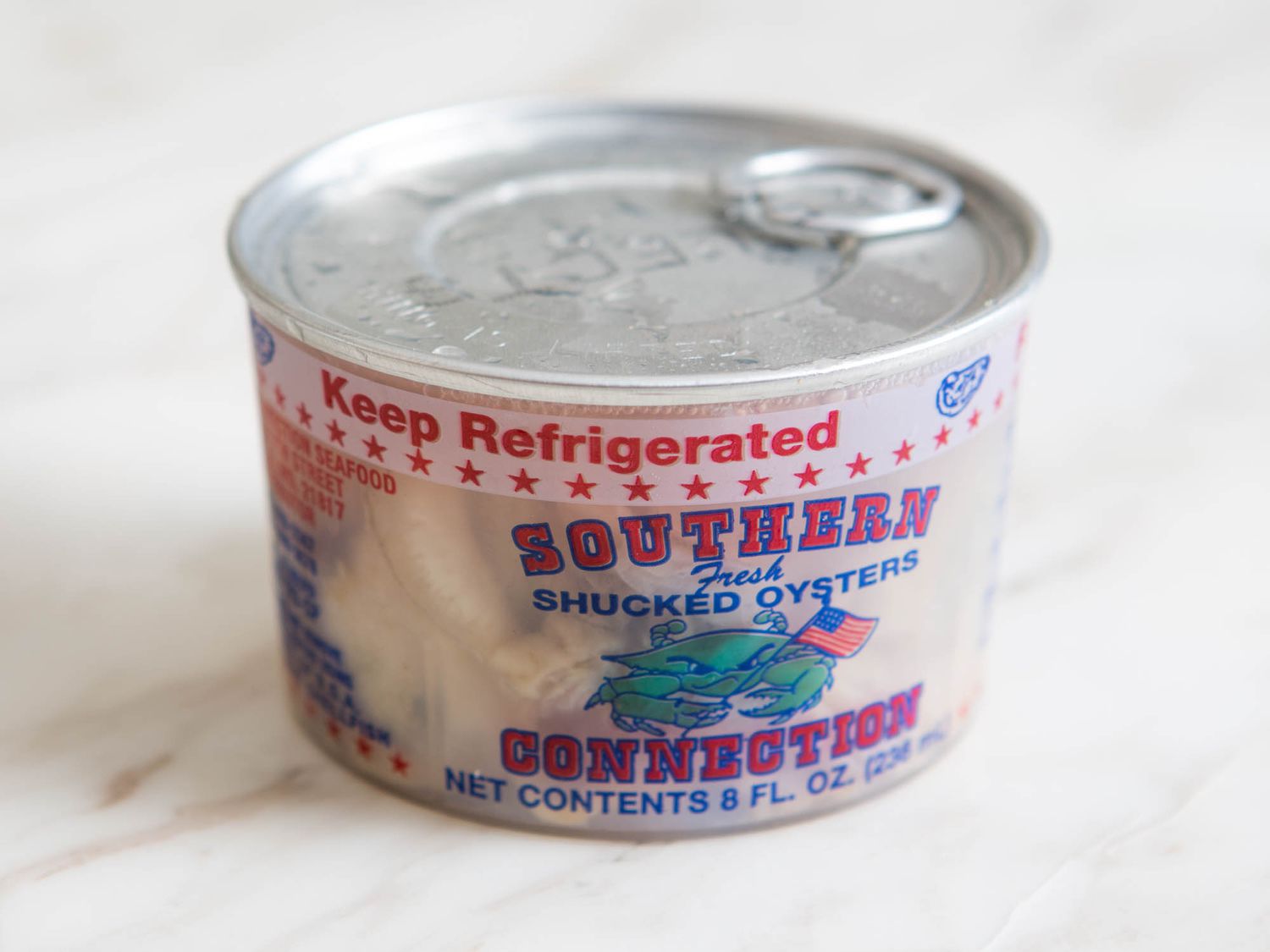 An 8-ounce container of pasteurized shucked oysters.