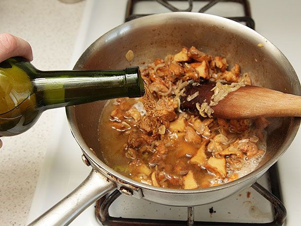 Dry sherry is added to the pan.