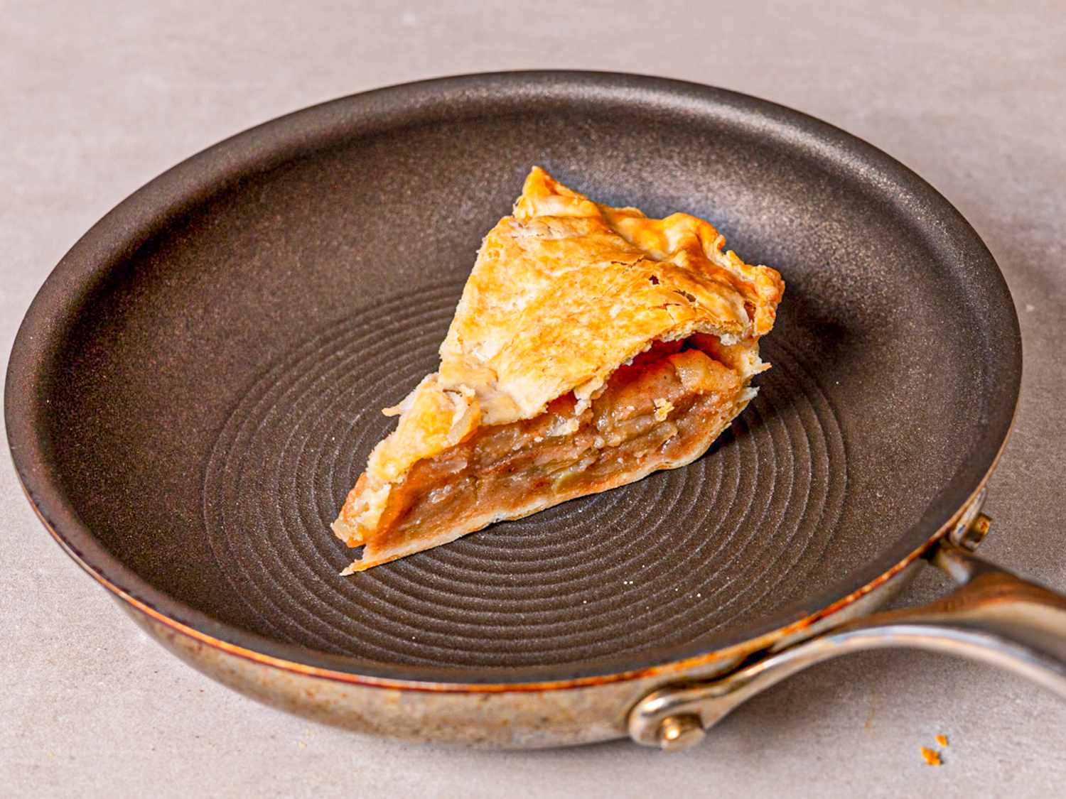 Slice of pie in a frying pan