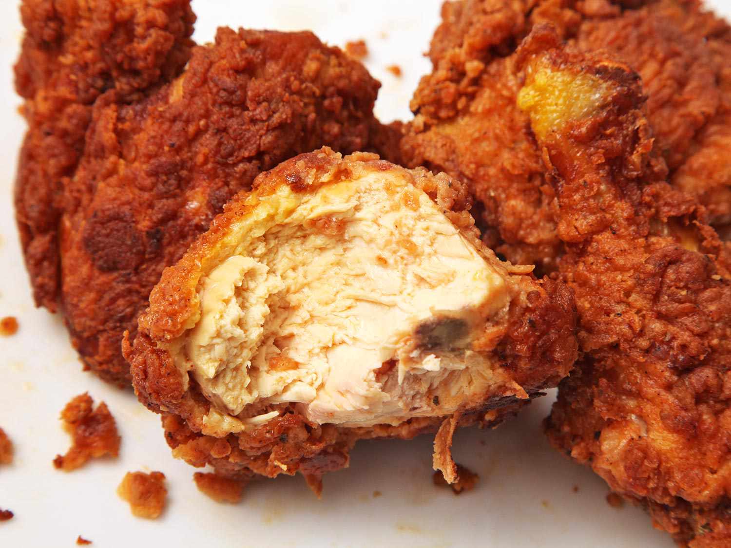 Closeup of interior of piece of fried chicken
